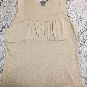 Gold shimmering top.